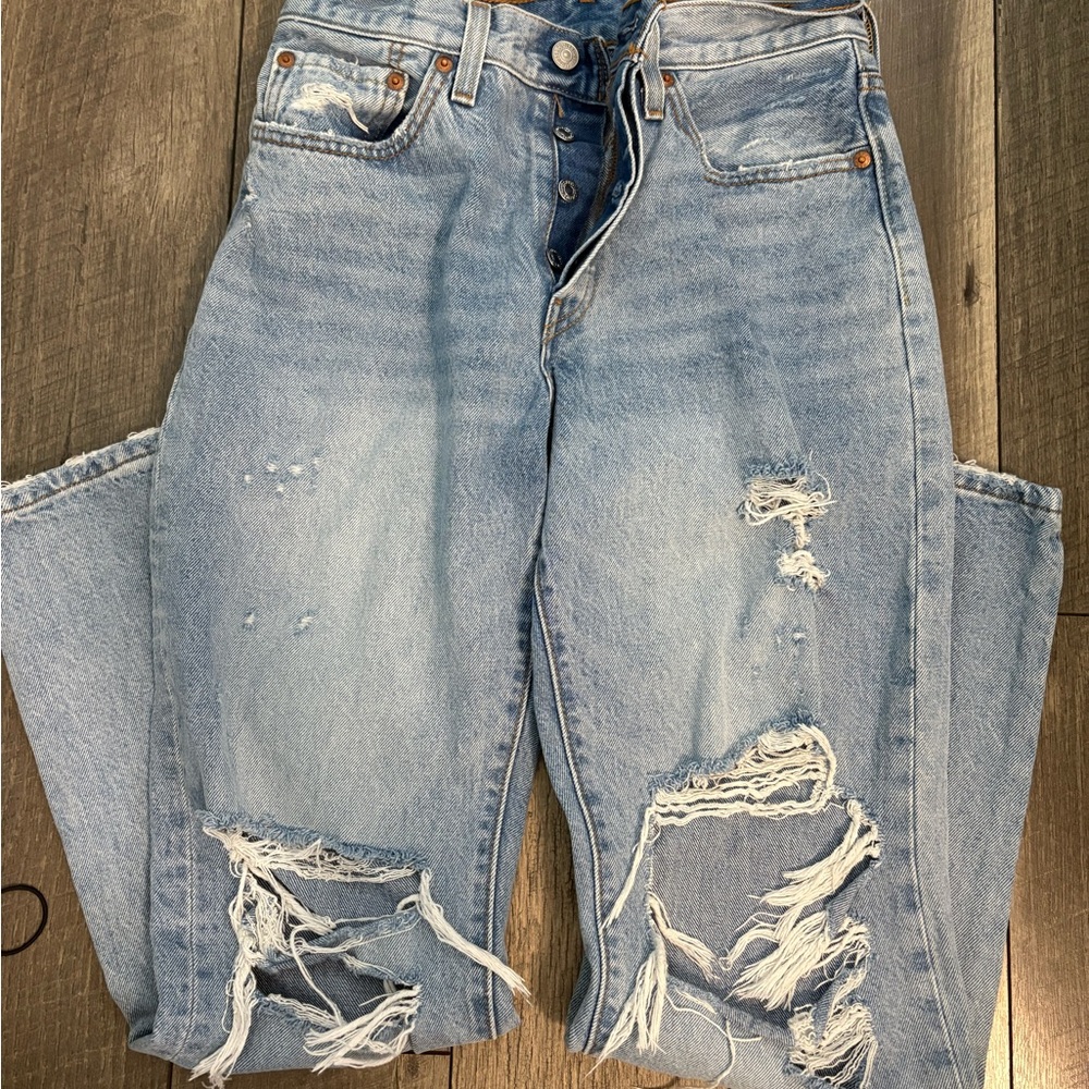 Distressed Light Blue Jeans